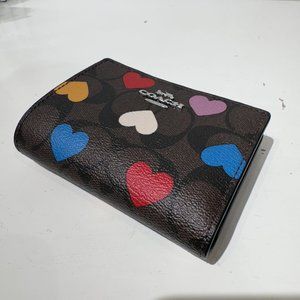 coach Bifold Wallet In Signature Canvas With Heart Print cp424